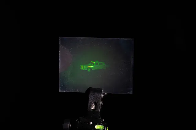 White light hologram of a model car from different viewing angles