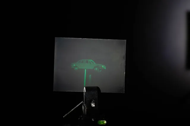 White light hologram of a model car from different viewing angles