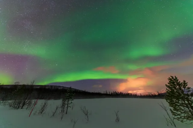 Northern lights in the Lyngenfjord Alps at the seventieth latitude